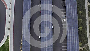 Solar panel project on car park roof, Santa Clarita, California, rising drone