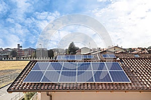 Solar panel on a red roof