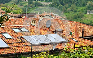 Solar panel on a red roof