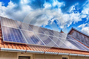 Solar panel on a red roof