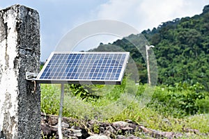 Solar panel with river view in the background.