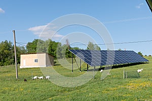 Solar panel with sunlight and blue sky background. Concept clean energy power in nature