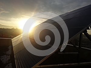 Solar panel, sunset view, green energy