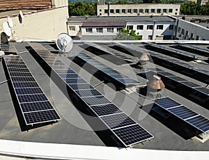 Solar panel system on the roof of the house. Green energy. Electricity. Solar panels on the roof. Green energy concept