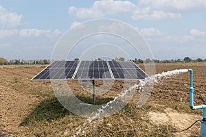 Solar panel for waterpump in agricultural field photo