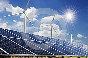 solar panel and wind turbine blue sky with sun background. concept clean power