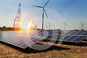 solar panel with wind turbine and sunlight. clean power energy c photo