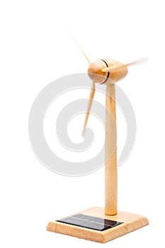 Solar panel and wooden wind turbine isolated