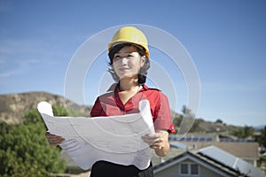 Solar Panel Worker Holding Blue Print