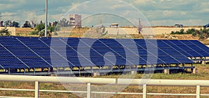 Solar panels are abreast in the summer. Selective focus