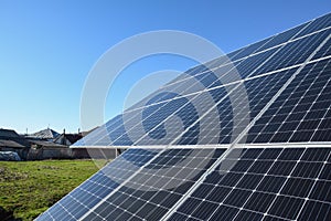 Solar panels against blue sky background.Against The Deep Blue Sky in suny weather