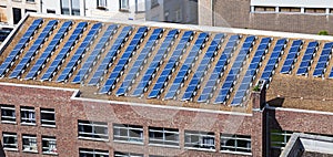 Solar panels on building roof photo