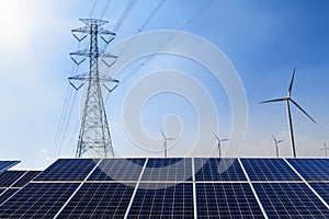 Solar panels with electricity pylon and wind turbine Clean power photo