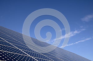 Solar panels for energy saving with blue sky behind