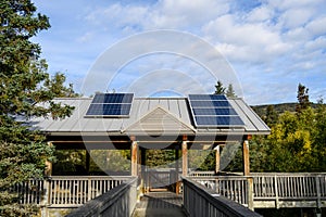 Solar panels in the fall landscape of Katmai National Park, Alaska
