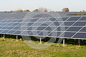 Solar panels on a field, collecting energy