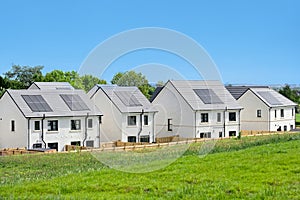 Solar panels installed on home roofs at new housing development