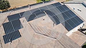 Solar Panels Installed on Roof of Large House Roof