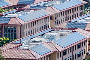 Solar panels installed on the tiled rooftops of buildings, San Francisco bay area, Silicon Valley, California