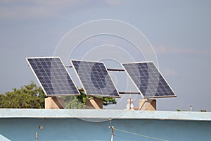 Solar panels made up of photovoltaic cells are placed on the rooftop for generating energy.