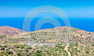 Solar panels in olive grove. Crete. Greece