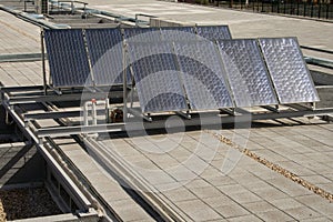 Solar panels over a building roof. photo