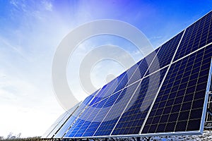 Solar panels Photovoltaic cells on a background of sunrise