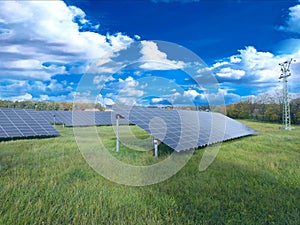 Solar panels in a photovoltaic power plant with background effect