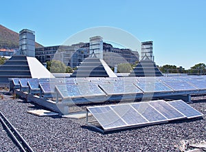 Solar panels or Polycrystalline Silicon Solar cells on rooftop of building photo