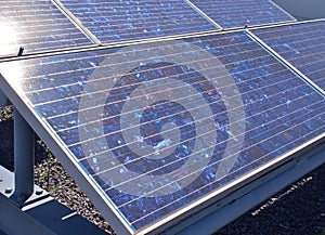 Solar panels or Polycrystalline Silicon Solar cells on rooftop photo