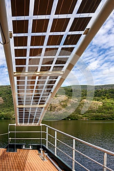 Solar panels power Lake Sanabria environmental cruise in Spain.