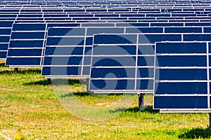 Solar panels of a PV system on a rural field for renewable energy generation