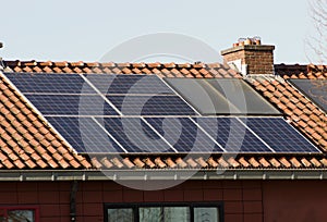 Solar panels on a red roof