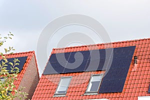 Solar panels on a red roof