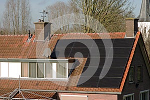 Solar panels on a red roof