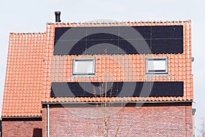 Solar panels on a red roof