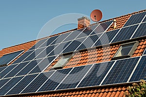 Solar panels on a red roof