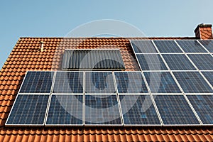 Solar panels on a red roof