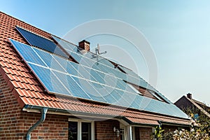 Solar panels on a red roof