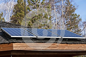 Solar panels on the roof of the house. Green energy.