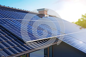 Solar panels on the roof of a house. Solar energy is an alternative energy source.