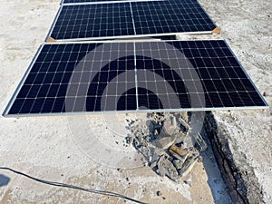 Solar Panels on a roof of a house to install solar power station for off-grid clean energy in Pakistan