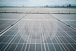 Solar panels on roof of industial building generate electricity