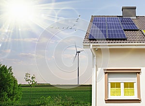 House with installed solar panels on roof. Copy space for text photo