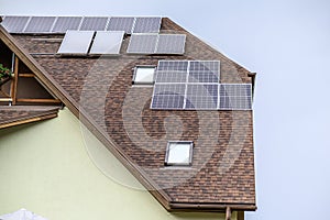 Solar panels on the roof of a private house. Ecological sources of energy