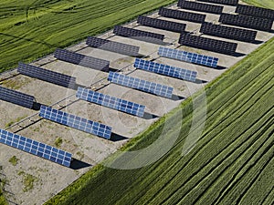 Solar Panels in summer field. Aerial Industrial View