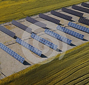 Solar Panels in summer field. Aerial Industrial View