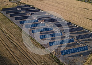 Solar Panels in summer field. Aerial Industrial View