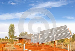 Solar panels, sun energy production in desert, Africa photo