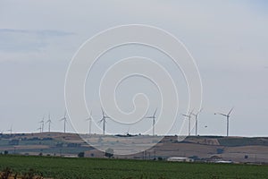 Solar panels with wind turbine and sunset .concept power energy